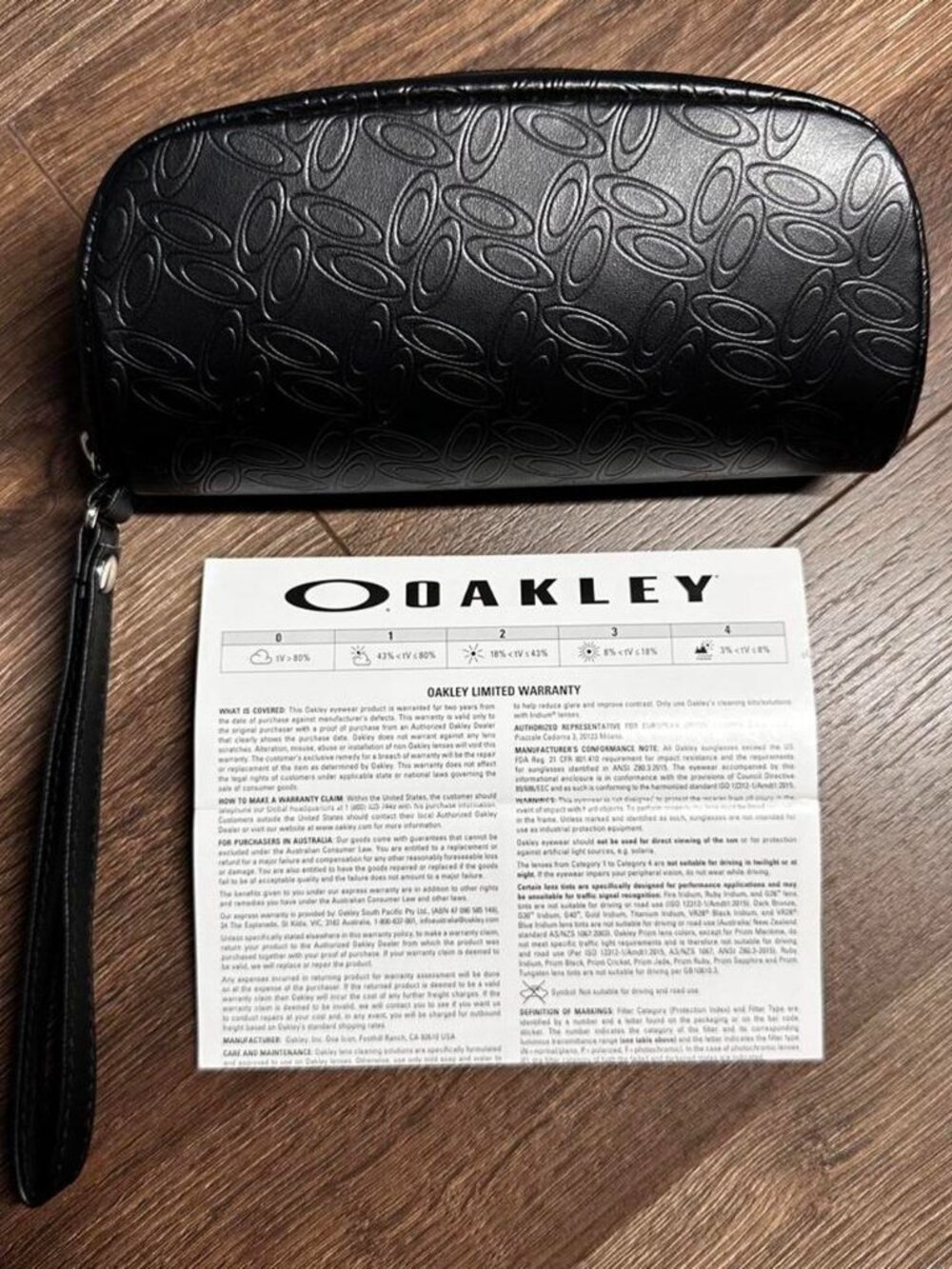 OAKLEY BLACK ZIPPERED SUNGLASSES CASE WITH WARRANTY PAPER